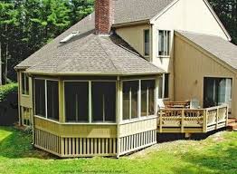 The Exterior View Of This Stunning Octagonal Living Room Addition Improves The Entire Design Of This Bo Craftsman Exterior Traditional Exterior Sunroom Designs