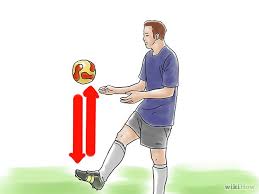 How To Juggle A Soccer Ball Soccer Training Soccer Skills Soccer Ball