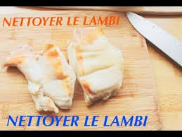 Nettoyer Le Lambi Consiste A Enlever La Glue Debarrasser Le Mollusque De Ses Parties Les Moins Comesti Recettes De Cuisine Cuisine Exotique Cuisine Antillaise