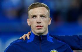 Celtic fan joins Rangers supporters in laying Jimmy Bell tributes at Ibrox  gates in honour of legendary kitman