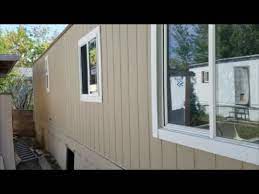 Usually these go in front of and behind the trailer tires. Trailer House Siding The Right Way To Re Side A Trailer House Mobile Home Youtube