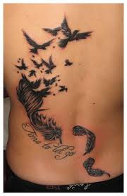 Bird Tattoos For Guys Meaning Pin By Beverly Marsteller On Tattoo Ideas Feather Tattoo Meaning Feather With Birds Tattoo Feather Tattoos