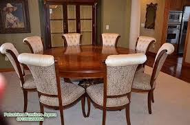 Bentuk sandaran kursi makan model silang menambah daya tarik tersendiri pada produk ini. Meja Makan Bundar Jati Besar Putushima Furniture