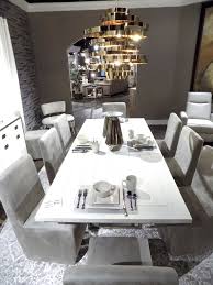 Set an accent metal lampshade on your living room floor, or a dainty, minimalist uplight lamp in your bedroom. At Home With High Style Kathy Ireland Michael Amini The Design Daily