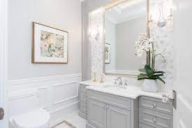 A powder room is traditionally defined as a bathroom that does not have a bathtub or most powder rooms are built in private homes and can be decorated with a variety of a perfect, crisp traditional half bath with ample storage. Cabot Drive Richmond Transitional Powder Room Vancouver By Monet Home Staging Houzz