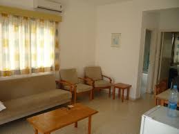 As i've mentioned previously, we're fighting against the tide to keep this home's footprint small. Living Room Dining Table Coffee Table Small Table Two Easy Chairs And Settee Picture Of Sweet Memories Protaras Tripadvisor