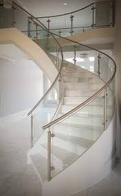 Elegant and modern stainless steel stairways are often combined to the transparency of glass to achieve a unique shiny and light staircase design. Glass Stainless Southern Staircase Artistic Stairs