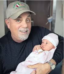 It's an (Uptown) girl! Billy Joel is a dad again...at age of 68