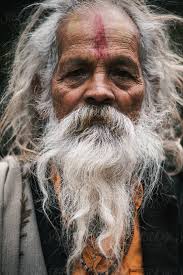 Elderly Indian Man With Long White Hair And Beard" by Stocksy Contributor  "Yakov Knyazev"