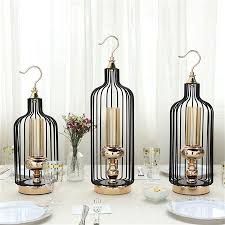 Bird Cage Candle Holders Wholesale Tall Gold Black Bird Cage Candle Holders With Glass Centrepiece A Bulk Buy Bird Cage Candle Holder Bird Cage Candle Glass Centerpieces