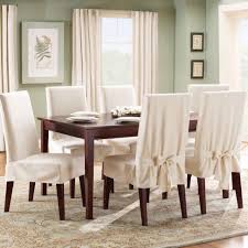 Whether your dining room just needs a new look, or you want to change up your dining style with the seasons, custom made dining chair slipcovers are a wonderful way to go for a number of reasons. Why Should You Use Chair Covers Dining Room Making Your Events Special With Dining Room Chair Slipcovers Dining Room Chair Covers Cheap Dining Room Chairs