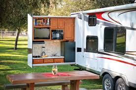 Explore a variety of travel trailer floorplans with outdoor kitchens. Take It Outside With An Outdoor Kitchen Trailer Life