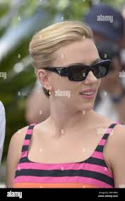 Jeffrey Wright, Scarlett Johansson and director Wes Anderson, attending the  photocall for Asteroid City during the 76th Cannes Film Festival in Cannes,  France. Picture date: Wednesday May 24, 2023. Photo credit should