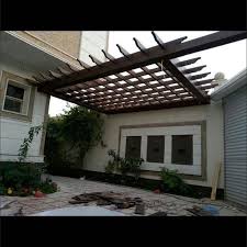مظلات خشبيه ظلال الخليج بالرياض 0558146744 تركيب مظلات برجولات حديد على شكل خشب بلاستيك صناعي للحدائق للمنازل بالريا wooden awning outdoor structures outdoor