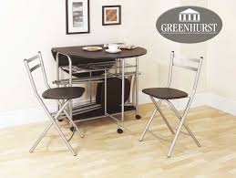 Folding chairs recently painted silver perfect for extra seats at christmas condition is used collection from nw1, outside of congestion. Folding Dining Set Drop Leaf Table And Chairs Butterfly Dining Table With Four Folding Dining Chairs Black Finish Buy Online In Angola At Angola Desertcart Com Productid 50128479