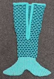The blanket is knitted flat, but the circular needles are needed to accommodate. Mermaid Tail Knitting Pattern Black Sheep Wools