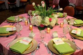 Whether it's a mini mason jar centerpiece or a fruit and flower centerpiece, your table centerpieces will get your guests in the spring spirit. Pink And Green Table Setting For 40th Birthday Party With Spring Floral Centerpiece Tea Party Table Settings Green Table Settings Fun Table Settings
