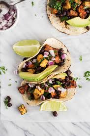 This healthy sweet potato cake is naturally sweetened with pure maple syrup and frosted with a yummy orange & cinnamon infused cream cheese frosting that's easily dairy free! Roasted Sweet Potato Zucchini Tacos Vegetarian Vegan Well Fed Soul