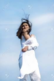 Hair png transparent images download #hairpng here you hair png , cb editing hair png, picsart men's hair png, stylish hair png, women's hair png, etc. Girl Stands On The Background Of The Sky Rolled Up In A Transparent Fabric Wind Waves Her Hair And White Clothes Concept Freedom Harmony Health Stock Photo Picture And Royalty Free Image