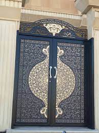 The main gate plays a significant role in adding character and personality to the house facade design. Pin By Ajay Kumar On Ø´Ø±ÙƒØ© Ø±Ù…Ø² Ø§Ù„Ø´Ù…Ø§Ù„www Rmzalshamal Com Iron Door Design Door Gate Design Exterior Door Designs