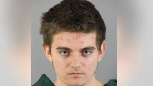 US teen charged in parents' deaths is accused of plotting to kill Trump