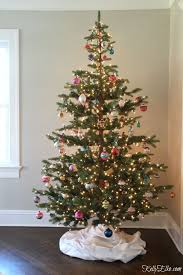 Love The Sparse Branches On This Norwegian Fir Christmas Tree I Can T Believe It S No Christmas Tree Inspiration Christmas Tree Ornaments Real Christmas Tree