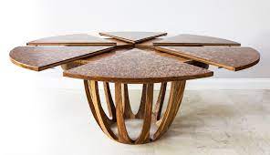 Just click anywhere on the table top to expand it. Johnson Furniture