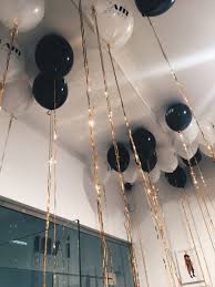 Black And White Balloons With Golden Tassels New Year S Eve Party Themes 18th Birthday Party Birthday Party 21