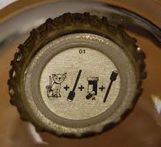 Batman & robin flattened bottle cap magnets. Lion Brewery Bottle Cap Rebuses The Benjamin S Weblog