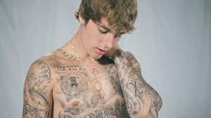 Justin beiber tattoo on elbow. Justin Bieber Reveals The One Area Of His Body That S Off Limits From Tattoos Entertainment Tonight