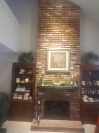 Pin spotlights that direct light onto individual artworks is a great way of illuminating them, says mishaan. Lighting Brick Fireplace Fireplace Led Lights