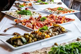 The most common buffet dinner table material is cotton. Party Brunch Big Buffet Table Setting With Food Meat Vegetables Stock Photo Picture And Royalty Free Image Image 106833360