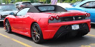 Ferrari has chosen to unveil the new scuderia spider 16m at the world finals in mugello in celebration of its recent victory in the formula 1 constructor's world championship 2008. File 2009 Ferrari F430 Scuderia Spider 16m Hagerty Parking Lot Rear Jpg Wikimedia Commons