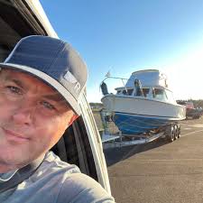 How can I get a towing quote to move my boat from Tacoma to Gig Harbor by  the end of the month?