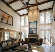 10 Decorating Ideas For Tall Walls High Ceiling Living Room Vaulted Ceiling Living Room Double Height Living Room