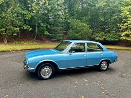 Image result for Rich Oak Metal 2014 Peugeot