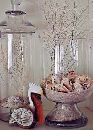 The following 50 christmas decoration ideas have been handpicked to help you find a project that will inspire you to embrace your artistic side of 2020. Clear Glass Hurricanes Decorating Ideas With Candles Beach Sand Shells More Coastal Decor Ideas Interior Design Diy Shopping