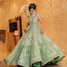How Gorgeous Is This Bridal Twirl In A Green Cinderella Gown Disneylandparis Disneyland Disn Indian Wedding Gowns Wedding Reception Gowns Reception Gown
