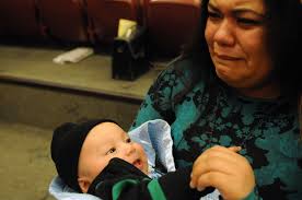 Family watches through tears video of inmate's fatal confrontation with  police