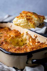 Classic Dauphinoise Potatoes Baked In A Creamy Garlic Sauce And Finished With Gruyere Cheese A Rich And Potatoes Dauphinoise Baked Dishes Creamy Garlic Sauce