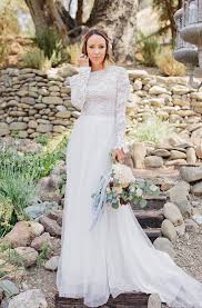 Venice lace adorns the illusion, jewel halter neckline. High Neck Lace Wedding Dresses Dressafford