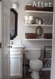 A mix of drawers and open bathroom storage makes the most of this double vanity. Bathroom Updates We Love Small Bathroom Organization Small Bathroom Bathroom Decor