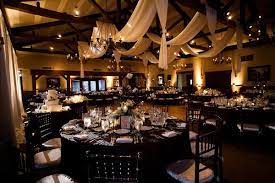 Beautiful Indoor Reception Seating Area Black Chairs With Ivory Cushions Black Tablecloths With Ivo Wedding Decor Elegant Fun Wedding Decor Indoor Reception
