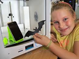 32324803-Wallyford Primary P5 pupil Lucy Meldrum visits Musselburgh  Library, to try the library s new 3D printer, bought with Scottish  Government ...