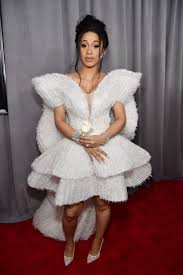 And while the red carpet and performance pieces immediately went viral, the white fringe dress she wore to collect her award has a special place in her heart. Grammy Awards 2018 Fashion Live From The Red Carpet Red Carpet Dresses Best Red Carpet Fashion Red Carpet Looks