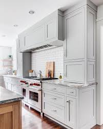 White and a rich, dark gray are my favorite colors to use in a kitchen. Note Use Of Large Drawer Pulls Rejuventation Kitchen Remodel Small Light Grey Kitchen Cabinets Kitchen Remodel
