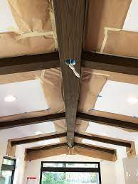 Wooden ceiling beams are a classic that never fail and combining them with a ceiling in wood gives the home office a chance to try out more traditional and rustic styles. Faux Wood Projects Before After Az Faux Beams Wood Beam Ceiling Faux Beams Wood Beams