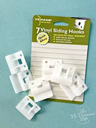 How To Hang Things On Vinyl Siding Without Damaging Your Home Vinyl Siding Hooks Vinyl Siding Outdoor Siding
