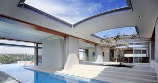 Just Watching The Clouds Pass On By Indoor Outdoor Pool Cool House Designs House Design