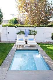 The surrounding is covered with the paving block and secured by the classic aluminum fence. 79 Raised Pools Ideas Backyard Pool Pool Designs Small Backyard Pools